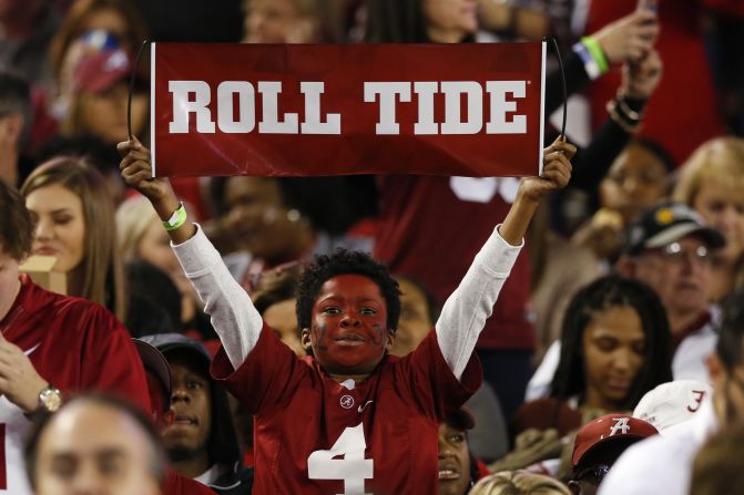 A young Alabama fan shows his support for the Crimson Tide.