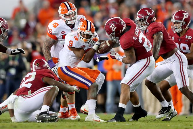 Alabama linebacker Ryan Anderson strips Gallman in the third quarter. The turnover led to an Alabama field goal and a 17-7 lead.