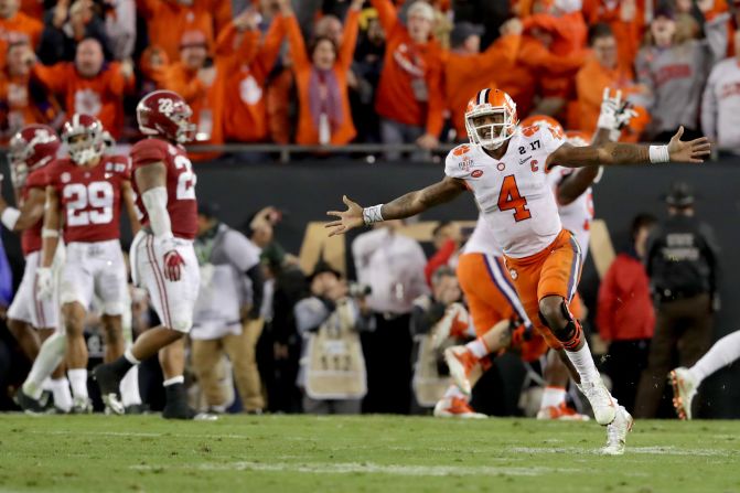 Clemson quarterback Deshaun Watson celebrates after throwing a touchdown pass to win the championship game of the College Football Playoff. Clemson defeated Alabama 35-31 for its first national title since 1981. The Tigers also avenged their loss to Alabama in last year's title game.