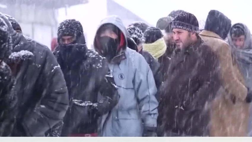 europe cold snap refugees walker pkg_00020813.jpg