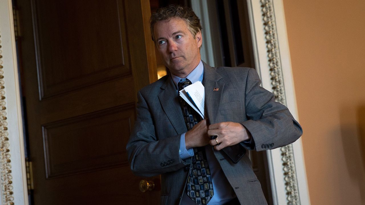 Sen. Rand Paul emerges from a closed-door weekly policy meeting with Senate Republicans at the U.S. Capitol on May 10, 2016.