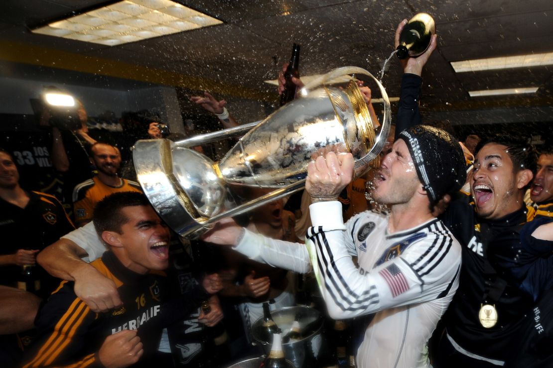Beckham celebrates winning the MLS Cup with the Galaxy in 2012.
