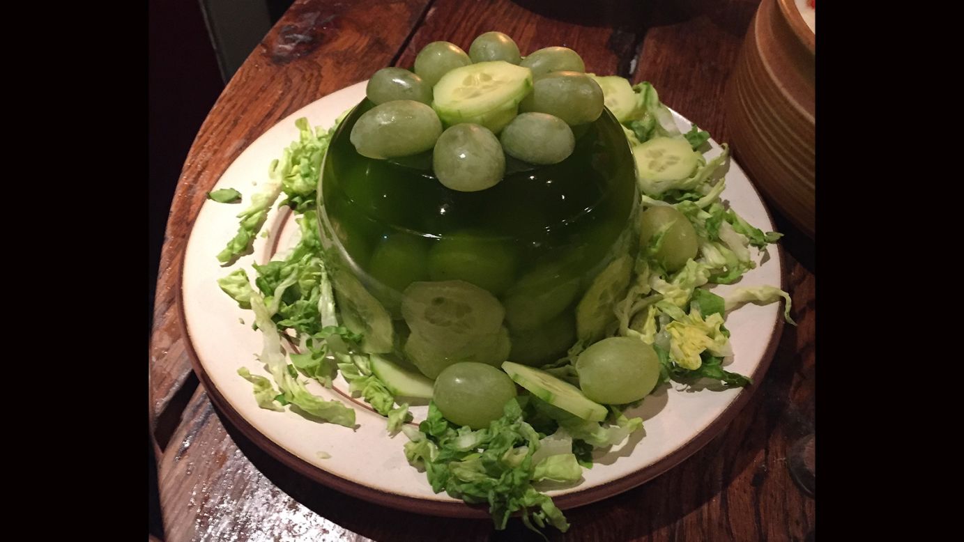 <strong>Cucumber and Grape Mold -- </strong>The mold here refers to the lime jello being shaped in a decorative container, rather than the greenish growth which develops on rotten food. We think. 