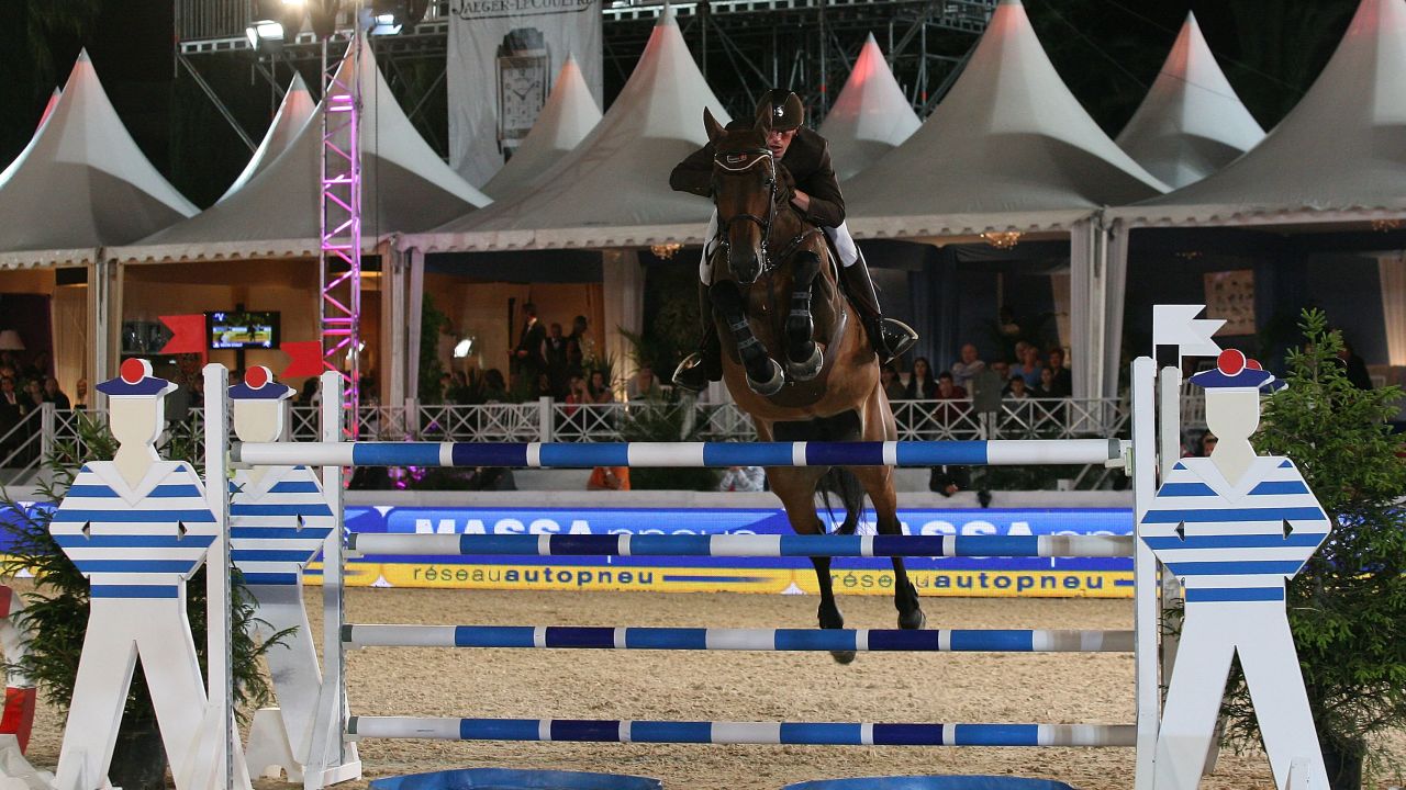 CANNES, FRANCE - JUNE 09:  Kevin Staut rides during the '30th International Cannes Jumping' Global Champion Tour 2011 on June 9, 2011 in Cannes, France.  (Photo by Marc Piasecki/Getty Images)