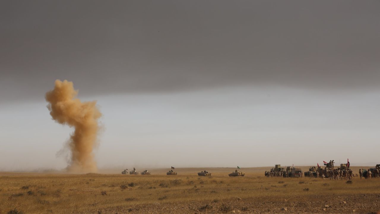 Soldiers of Iraqi Army and Hashd al-Shaabi militias arrive at Saleh Village after retaking of Khalid, Saleh and Zanawer Villages of Qayyarah Town from Daesh terrorists during the operation to retake Iraq's Mosul from Daesh terrorists, in Mosul, Iraq on October 20, 2016.