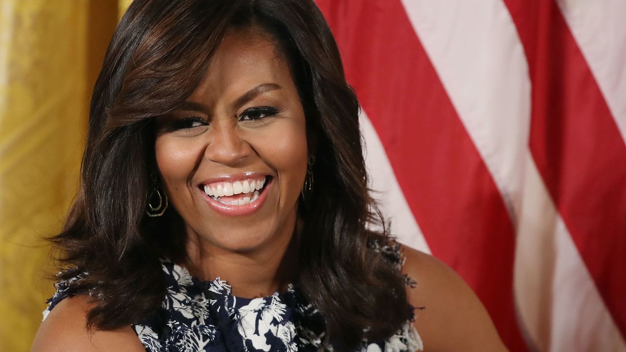 WASHINGTON, DC - JULY 19:  First lady Michelle Obama participates in an event with future college students in the East Room at the White House July 19, 2016 in Washington, DC. The first lady hosted the third annual "Beating the Odds" summit with more than 130 college bound students as part of the "Reach Higher" initiative and "Better Make Room" campaign. Critics claim that sections of a speech by Melania Trump, wife of the presumptive Republican nominee for president, on day one of the Republican National Convention last night were lifted virtually verbatim from a speech Michelle Obama made in 2008 at the Democratic National Convention. The Trump campaign has dismissed the complaints.  (Photo by Mark Wilson/Getty Images)