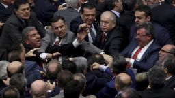 Ruling Justice and Development party and opposition Republican People's Party legislators scuffle in Turkey's parliament on Wednesday.