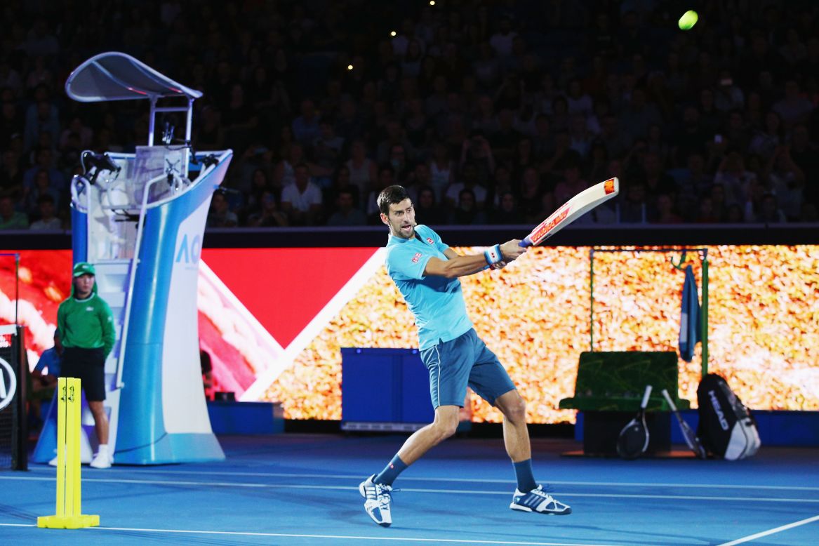 Djokovic -- who was raising funds for his eponymous foundation, which provides preschool education for children -- uses his famous forehand technique as he leathers the ball.