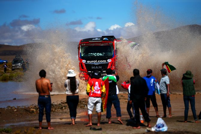 Keep on trucking: Fans watch the big machines in action during stage eight between Uyuni and Salta, Argentina. 