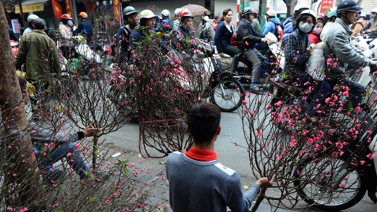<strong>Hanoi, Vietnam -- Tet flower market: </strong>Known as Tet in Vietnam, Lunar New Year is the most important holiday in the country. Dodging motorcyclists while visiting a local flower market is part of the fun of celebrating the festival in Hanoi.