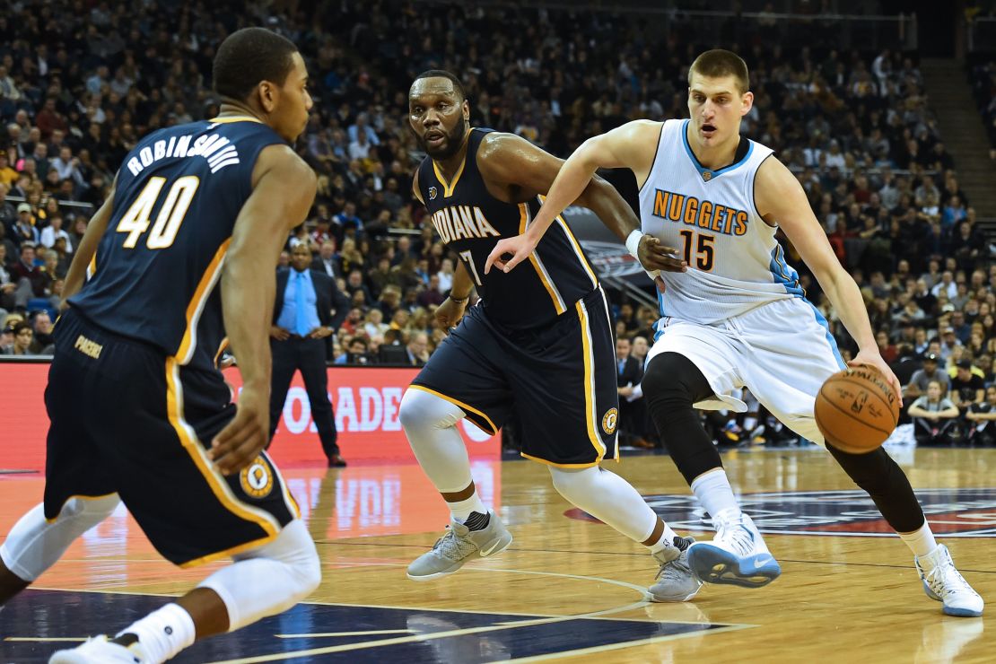 Denver forward Nikola Jokic leads the attack against the Pacers.