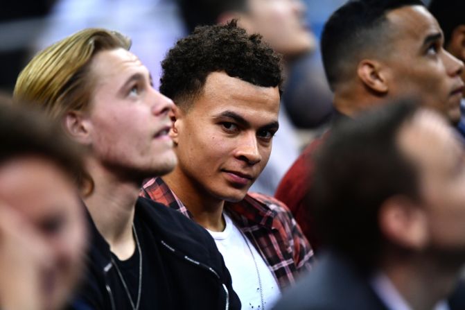 Dele Alli, who plays for Arsenal's north London rival Tottenham, looks on.