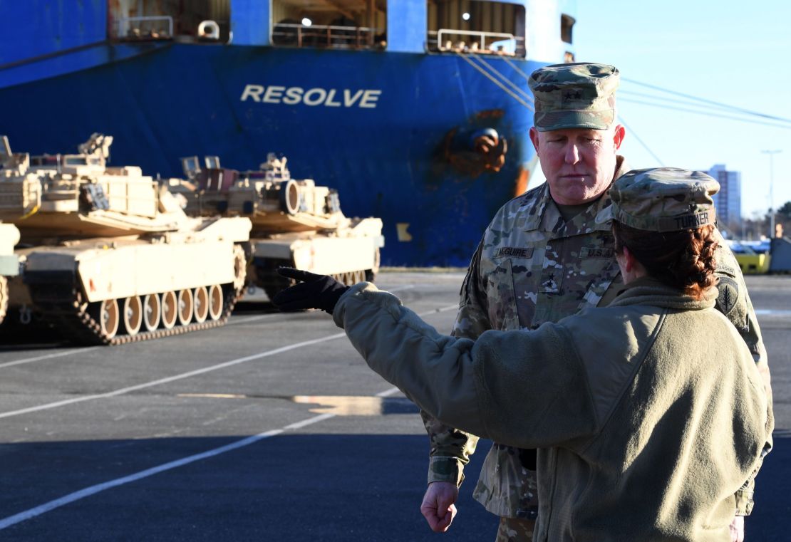 Maj. Gen. Timothy McGuire, deputy commander of US miltary in Europe, supervises the unloading of US military vehicles from a transport ship in the harbor in Bremerhaven, northwestern Germany.