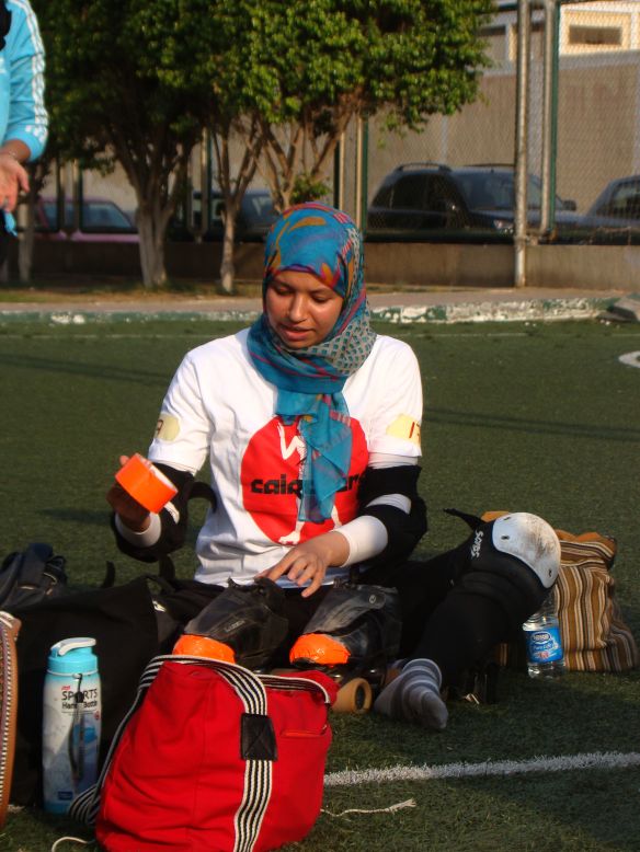 The group has more than doubled in size since its formation in 2012 by two American teachers. It is now almost exclusively made up of Egyptian women. A few wear hijabs, many cover up completely, but all skate wearing t-shirts branded with the CaiRollers logo - an image of the Egyptian goddess Isis on roller skates. <br /><br />Pictured:  Shimaa Samhan, a project coordinator has also been with the group for over three years. On track, her adopted name is 'Sheen Machine'. 