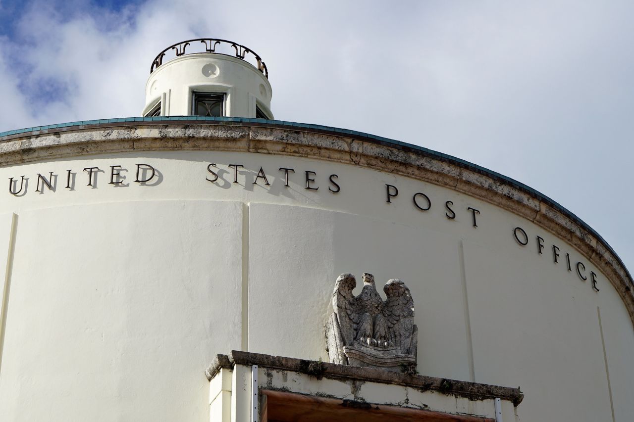 Built in 1939, the interior of the rotunda of the Miami Beach United States Post Office still features decorative detail and murals from that time. 