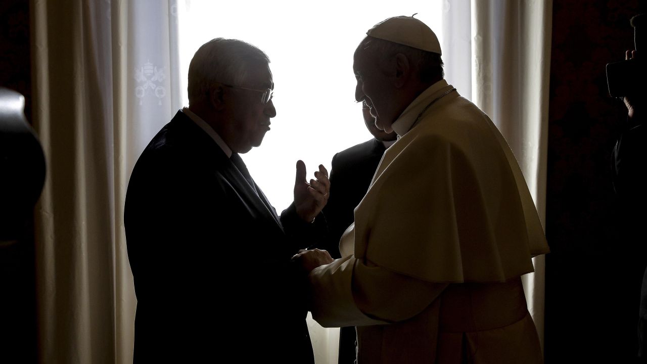 Pope Francis, right, meets with Palestinian President Mahmoud Abbas during a private audience at the Vatican.
