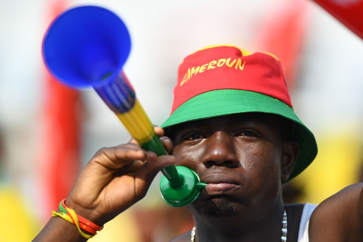 But it wasn't just Gabon fans in attendance. Here, a Cameroon supporter gestures towards the camera. Cameroon was facing Burkina Faso later in the day in Libreville.