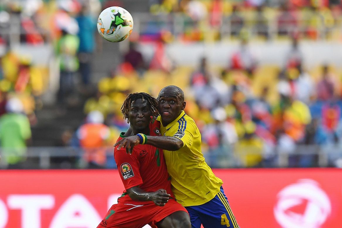Guinea-Bissau's midfielder Zezinho (L) challenges Gabon's midfielder Merlin Tandjigora for possession in a closely fought first period that ended scoreless.