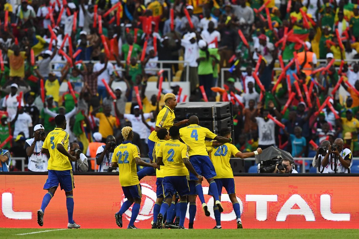 Gabon's players celebrate opening the scoring.