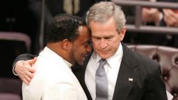 President George Bush hugs Bishop Eddie Long during Coretta Scott King's 2006 funeral.