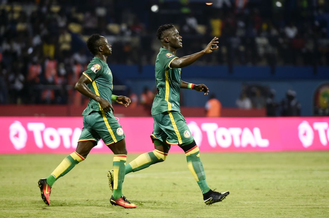 Senegal scorers Sadio Mane (left) and Kara Mbodji celebrate during Sunday's 2-0 win over Tunisia.