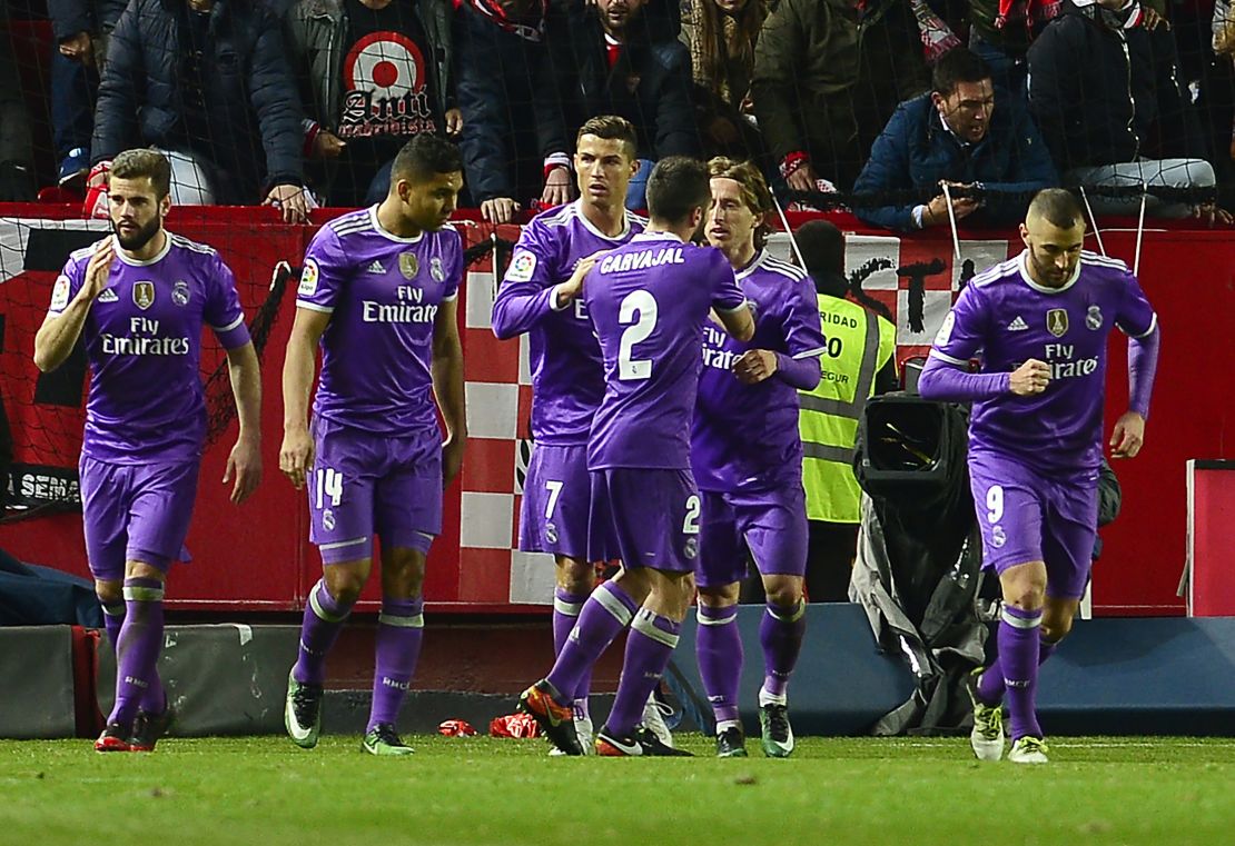 Real Madrid's Cristiano Ronaldo (3rdL) celebrates after putting his side ahead against Sevilla.