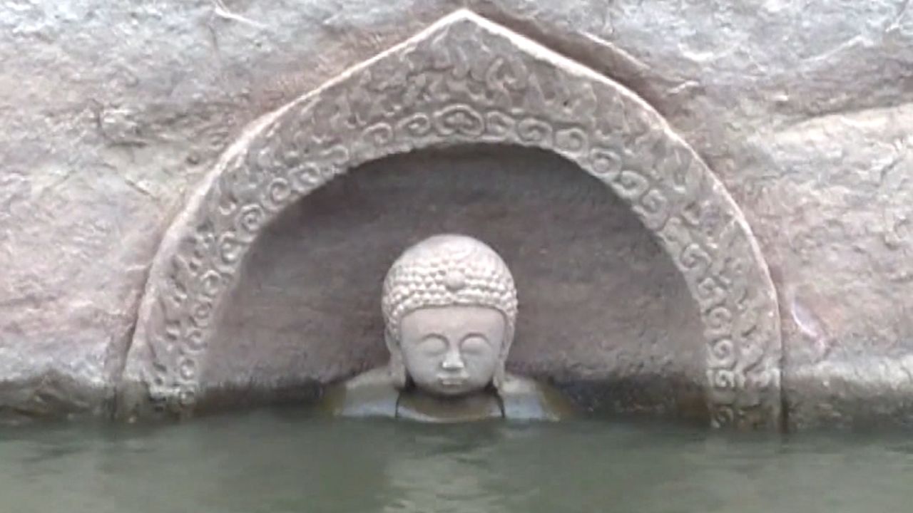 The statue was submerged in 1960 when the Hongmen reservoir was built.