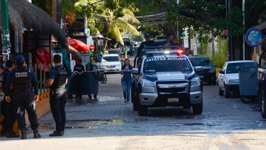 Mexican police agents patrol near a nightclub in Playa del Carmen, Quintana Ro state, Mexico where 5 people were killed, three of them foreigners, during a music festival on January 16, 2017.
A shooting erupted at an electronic music festival in the Mexican resort of Playa del Carmen early Monday, leaving at least five people dead and sparking a stampede, the mayor said. Fifteen people were injured, some in the stampede, after at least one shooter opened fire before dawn at the Blue Parrot nightclub during the BPM festival.


 / AFP PHOTO / STRSTR/AFP/Getty Images