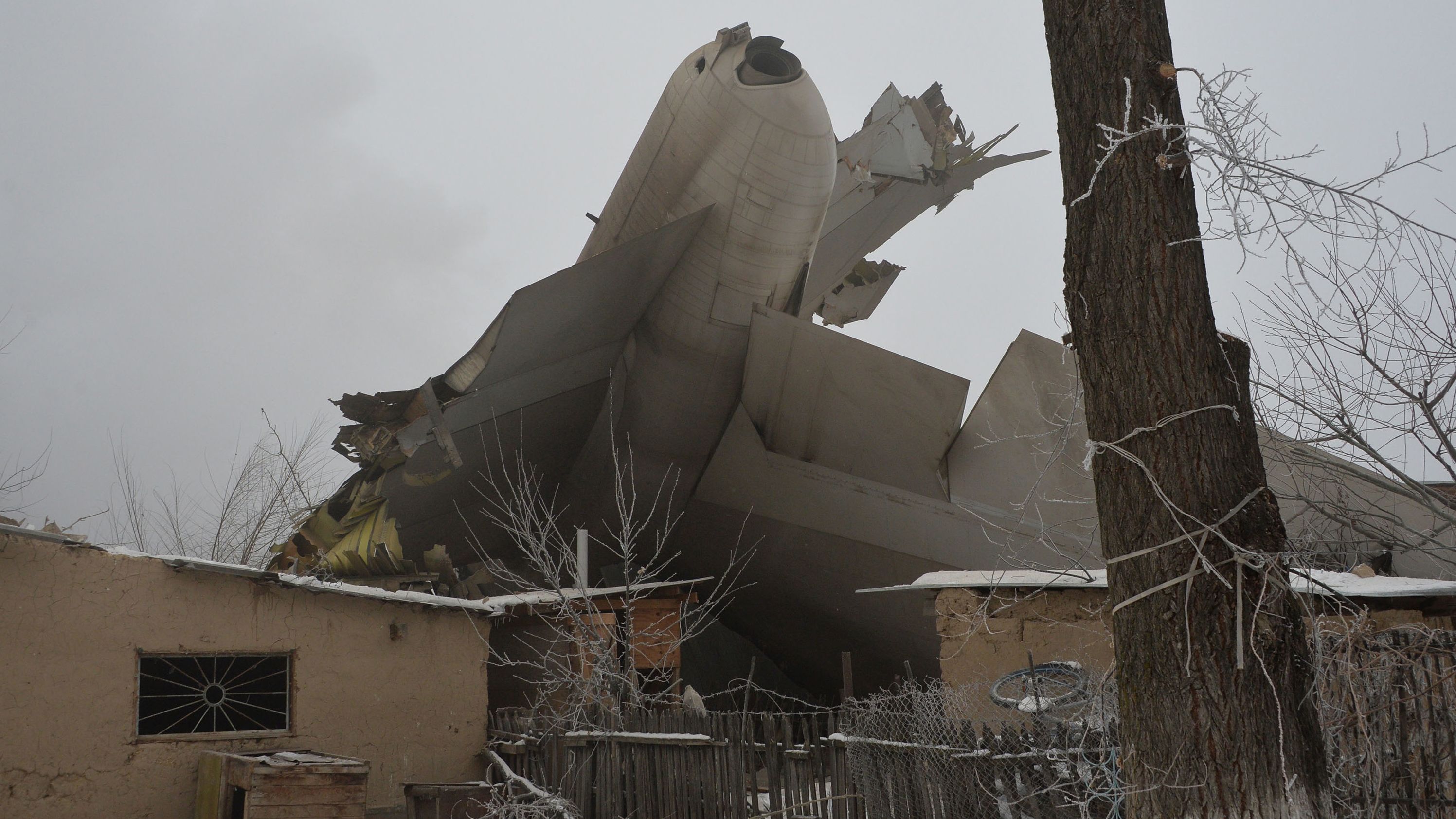 The wreckage of a Turkish cargo plane is seen after it crashed in a village outside Bishkek.