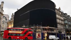The advertising screens at Piccadilly Circus, central London, after they were switched off in preparation for redevelopment Monday Jan.  16, 2017. The iconic lights have gone out so that the electronic hoardings can be replaced with a state-of-the-art screen measuring 790 square metres which is expected to be unveiled in the autumn. (Dominic Lipinski/PA via AP)