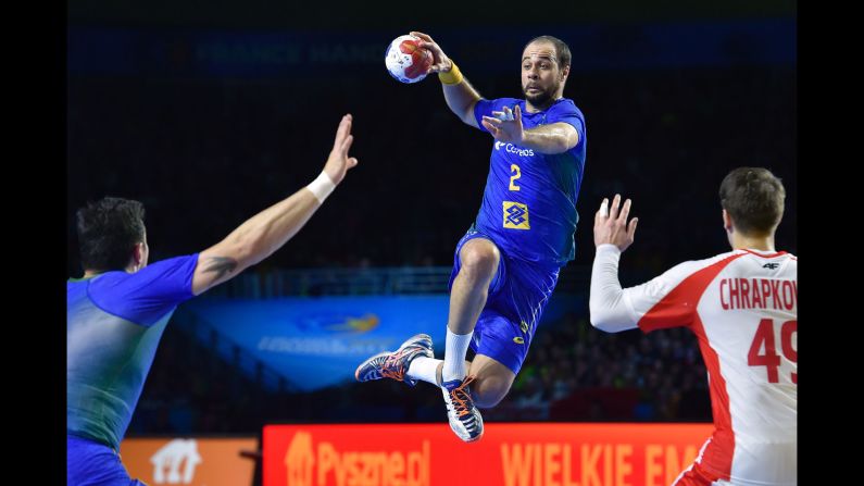 Brazil's center back Henrique Teixeira passes the ball during the 25th IHF World Men's Handball Championship  match against Poland on January 14.