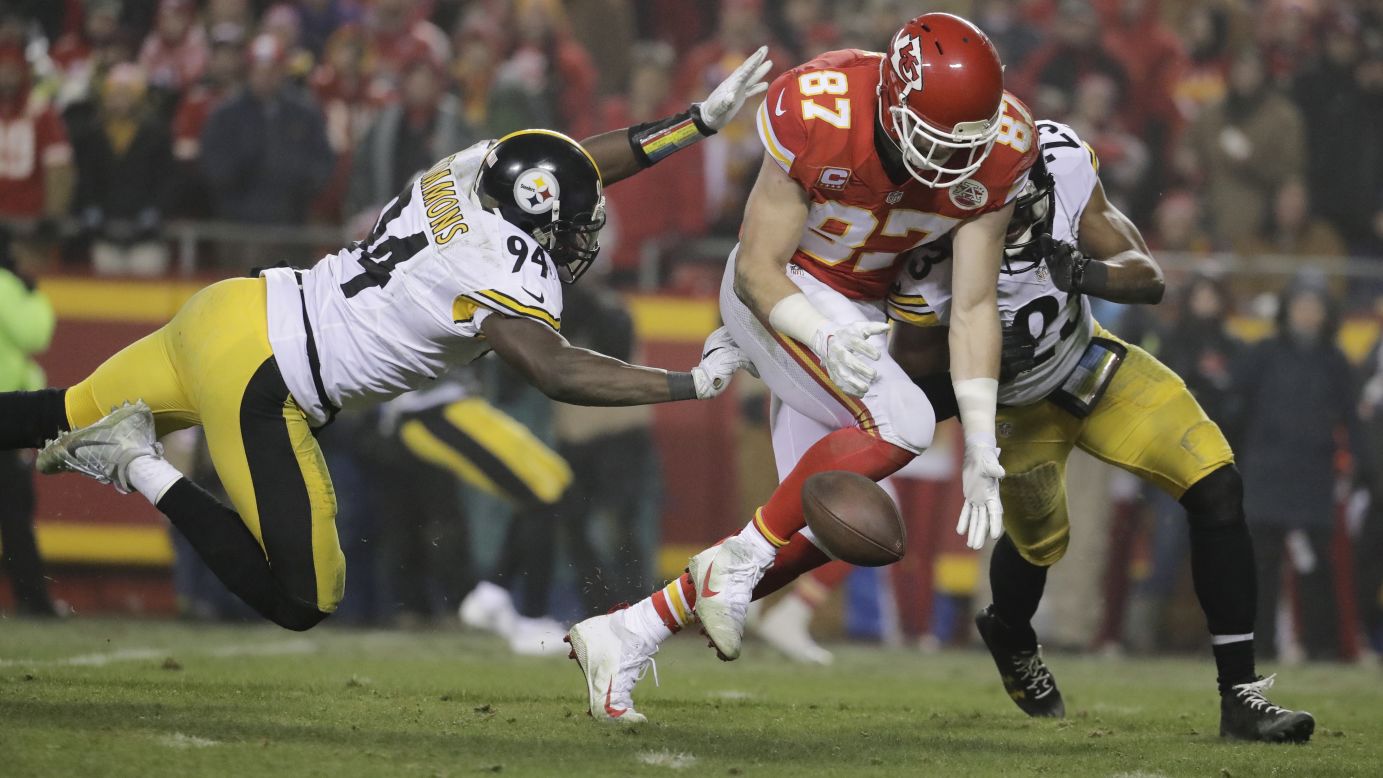 Kansas City Chiefs tight end Travis Kelce, center, drops a pass between Pittsburgh Steelers' Lawrence Timmons, left, and Mike Mitchell, during an AFC divisional playoff game on Sunday, January 15, in Kansas City. The Steelers will continue on to face the New England Patriots.