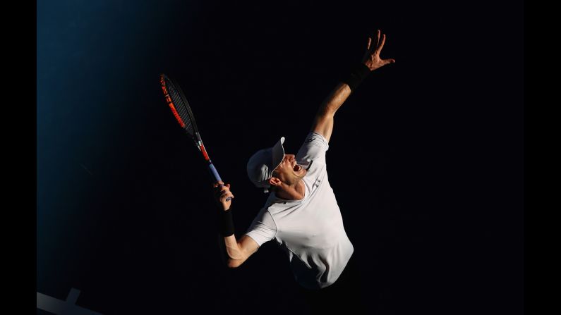 Andy Murray of Great Britain serves in his first round match against Illya Marchenko of the Ukraine on the first day of the 2017 Australian Open on January 16, 2017, in Melbourne.