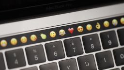 CUPERTINO, CA - OCTOBER 27: Emoticons are displayed on the Touch Bar on a new Apple MacBook Pro laptop during a product launch event on October 27, 2016 in Cupertino, California. Apple Inc. unveiled the latest iterations of its MacBook Pro line of laptops and TV app. (Photo by Stephen Lam/Getty Images)