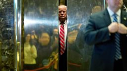 US President-elect Donald Trump boards the elevator after escorting Martin Luther King III to the lobby after meetings at Trump Tower in New York City on January 16, 2017.  / AFP / DOMINICK REUTER        (Photo credit should read DOMINICK REUTER/AFP/Getty Images)