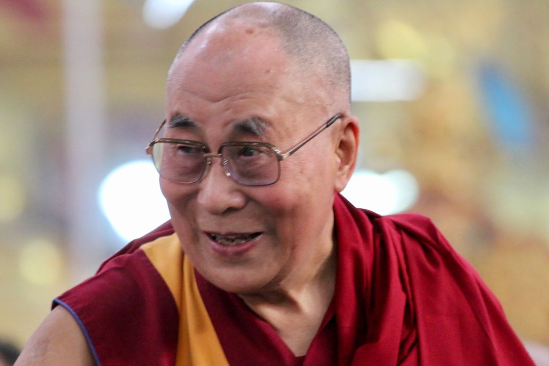 The Dalai Lama takes in the crowd at the Emory-Tibet symposium of Scholars and Scientists held at the Drepung Monastic University in December.  
