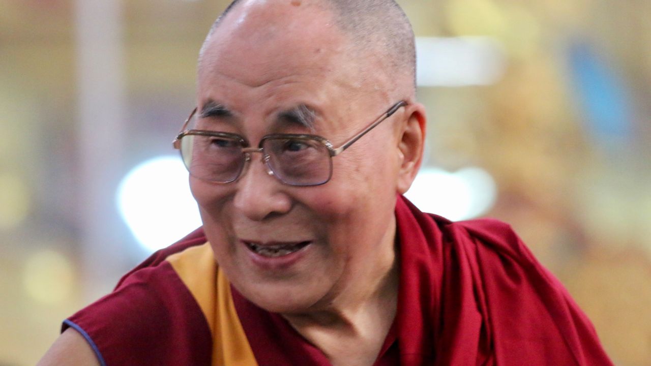 The Dalai Lama takes in the crowd at the Emory-Tibet symposium of Scholars and Scientists held at the Drepung Monastic University in December.  