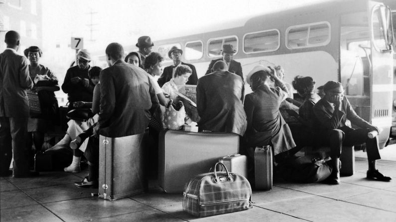 Civil rights activists known as Freedom Riders sit at a bus station in Birmingham, Alabama, in May 1961. That month, the Freedom Ride movement began with interstate buses driving into the Deep South to challenge segregation that persisted despite recent Supreme Court rulings. In some cities, the activists were arrested and brutally beaten.