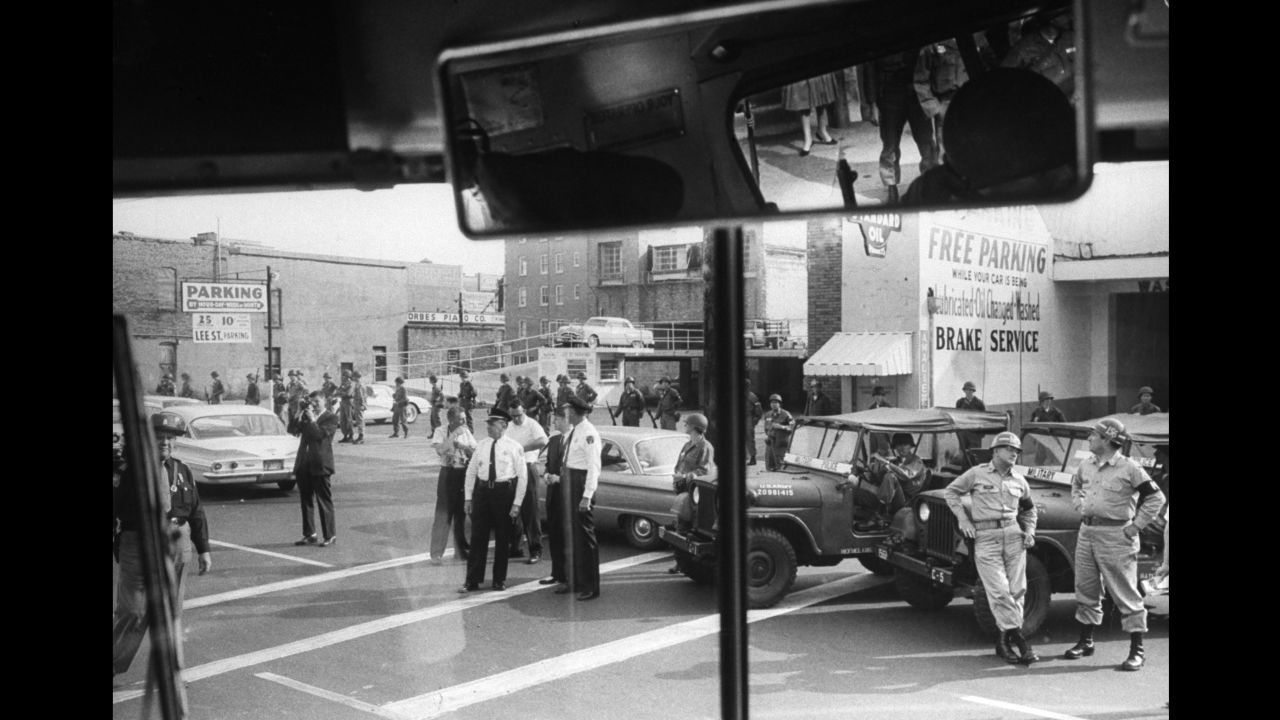 National Guardsmen and U.S. marshals from Mississippi are seen through a bus window as Freedom Riders travel from Montgomery, Alabama, to Jackson, Mississippi.