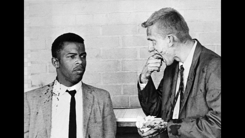 John Lewis, left, and James Zwerg stand together after being attacked and beaten by segregationists in Montgomery, Alabama, on May 20, 1961. Lewis is now a U.S. congressman from Georgia. <a href="index.php?page=&url=http%3A%2F%2Fwww.cnn.com%2F2011%2FUS%2F05%2F16%2FZwerg.freedom.rides%2F" target="_blank">Zwerg tells the story behind the photo</a>