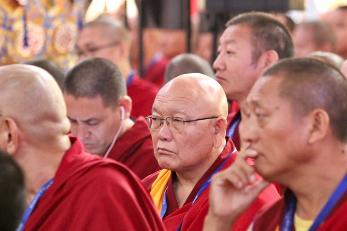 Monks listen to the Dalai Lama at the Emory-Tibet symposium.  
