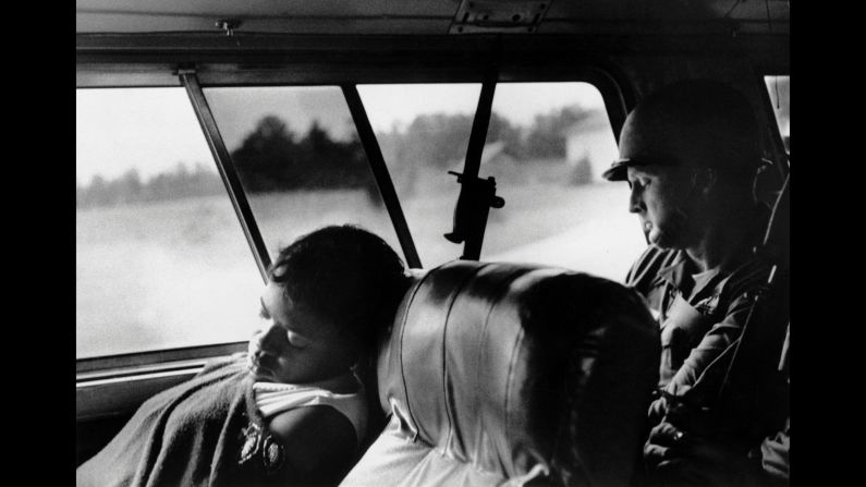 A Freedom Rider and a National Guardsman sleep on a bus ride from Selma, Alabama, to Montgomery.