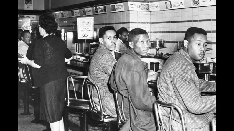 Ronald Martin, Robert Patterson and Mark Martin sit at a whites-only lunch counter in Greensboro, North Carolina, on February 2, 1960. A day earlier, four African-American college students made history when they sat at the same Woolsworth's counter. Service never came for the "Greensboro Four," as they came to be known, and their peaceful demonstration drew national attention and sparked more sit-ins in Southern cities.