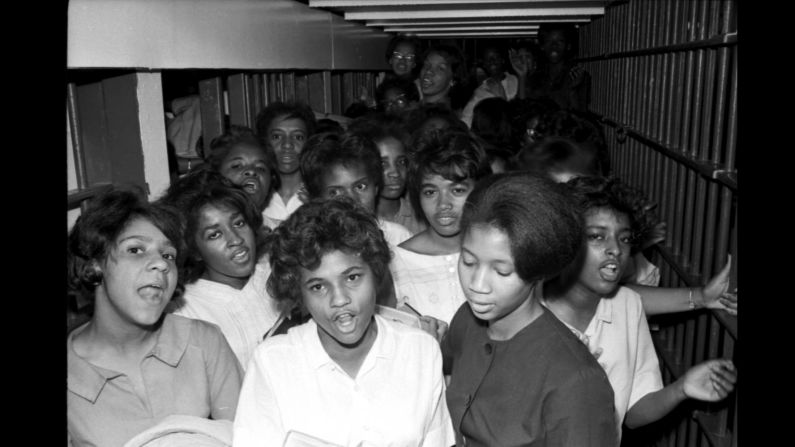 Protesters fill a jail cell in Raleigh, North Carolina, in 1963. A year later, <a href="index.php?page=&url=http%3A%2F%2Fwww.cnn.com%2F2014%2F04%2F10%2Fpolitics%2Fcivil-rights-act-interesting-facts%2F" target="_blank">the Civil Rights Act</a> outlawed discrimination in public places and facilities and banned discrimination based on race, gender, religion or national origin.
