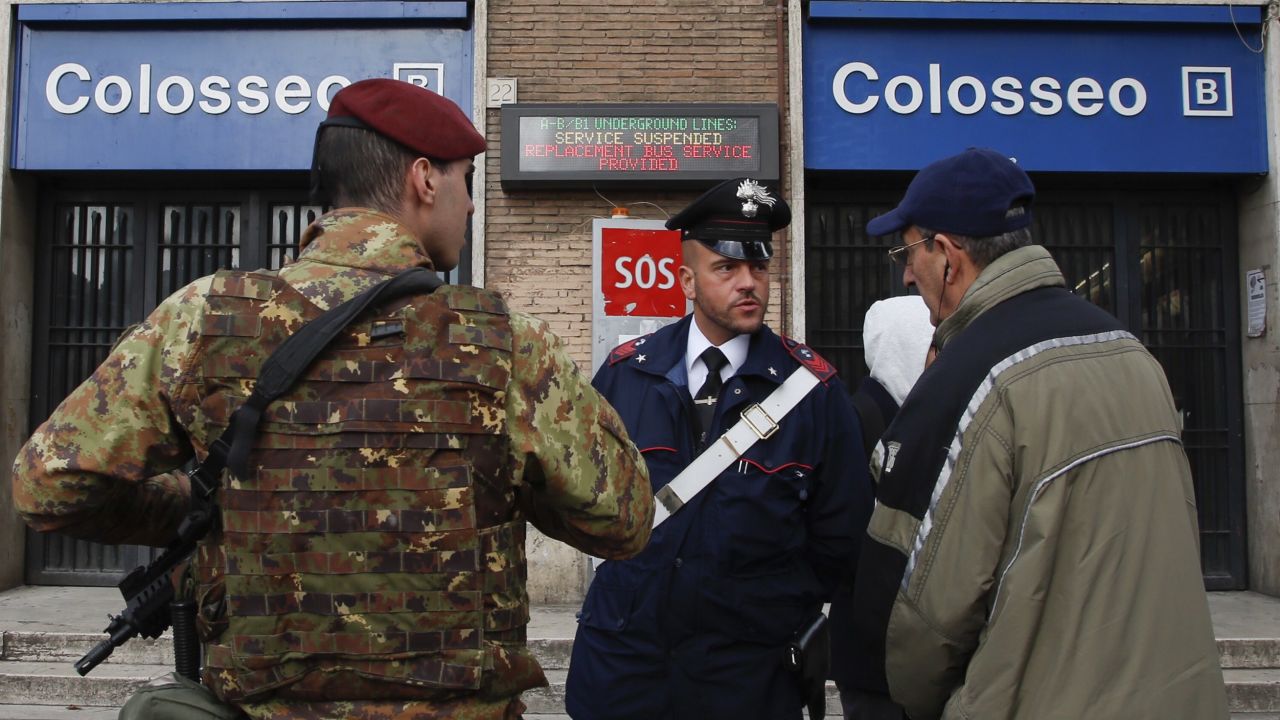 A man ask officers for information after the Colosseo subway station was closed following three earthquakes which hit central Italy in the space of an hour, shaking the same region that suffered a series of deadly quakes last year, in Rome, Wednesday, Jan. 18, 2017. There were no immediate reports of casualties but tremors were felt as far away as Rome, where the subway was closed as a precaution and parents were asked to pick up their children early from schools.