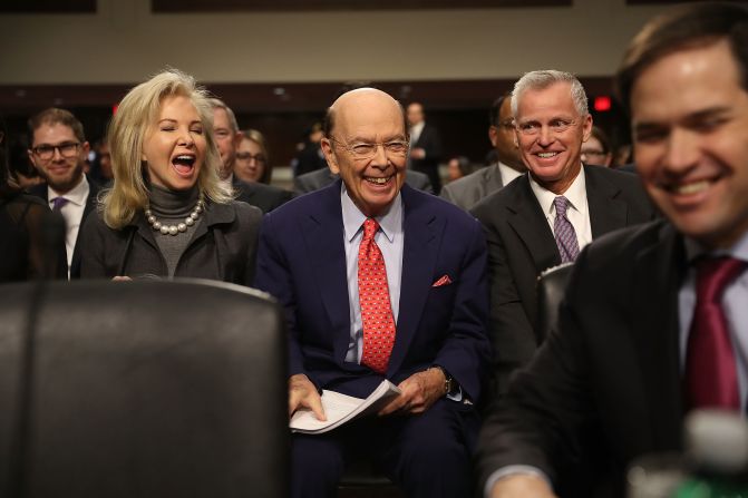 Ross, center, waits to be introduced by US Sen. Marco Rubio, right, at his confirmation hearing in January. At the hearing, Ross said he wants countries that resort to "malicious" trading tactics to be "severely" punished. He <a href="index.php?page=&url=http%3A%2F%2Fmoney.cnn.com%2F2017%2F01%2F18%2Finvesting%2Fwilbur-ross-hearing-trump-commerce-secretary%2Findex.html" target="_blank">pointed the finger at China,</a> which he called "the most protectionist country of very large countries."