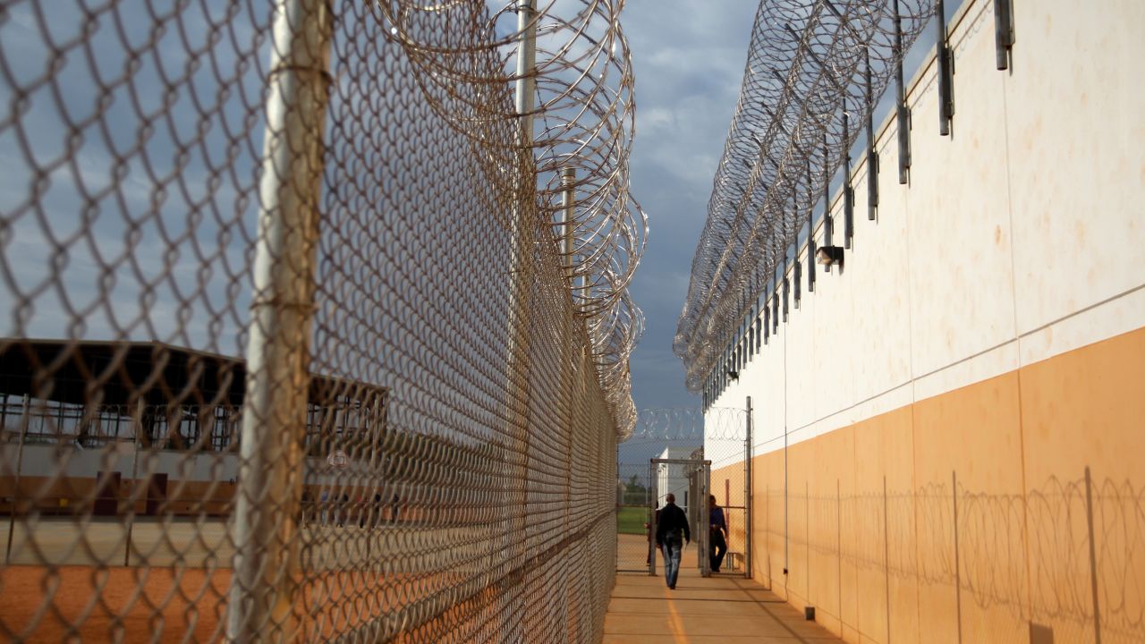 Barbed wire surrounds the toughest immigration court in the continental United States.