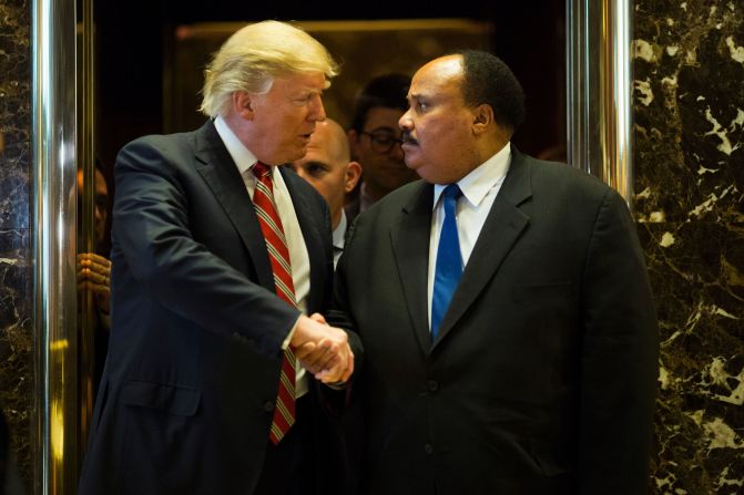 President-elect Donald Trump shakes hands with Martin Luther King III <a href="index.php?page=&url=http%3A%2F%2Fwww.cnn.com%2F2017%2F01%2F16%2Fpolitics%2Fdonald-trump-martin-luther-king-day%2F" target="_blank">after they met at Trump Tower</a> in New York on Monday, January 16. Afterward, King said the meeting was "constructive" and that the two discussed the importance of voting accessibility. Trump didn't speak to the media about the meeting.