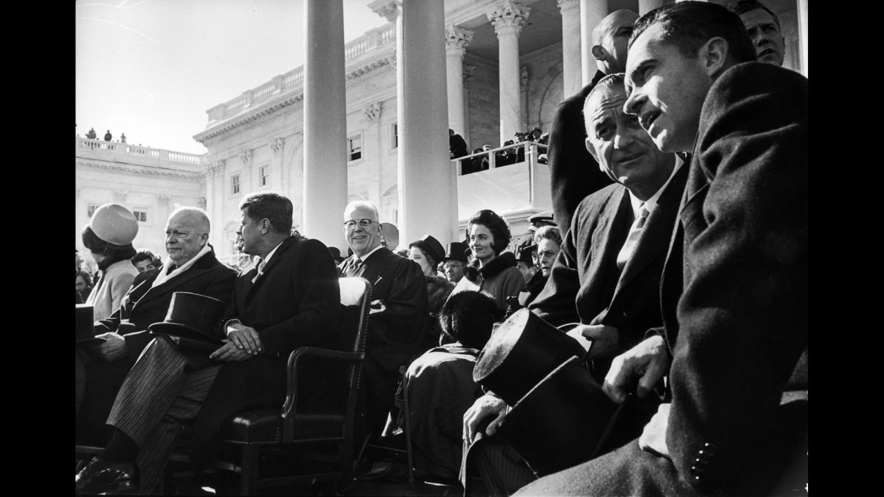 Kennedy, seated third from left, on Inauguration Day. Kennedy was both the first Catholic and one of the youngest people elected to the presidency. In 1960, the Massachusetts senator was 43 years old when he won the presidential election against Republican nominee Vice President Richard Nixon, far right.