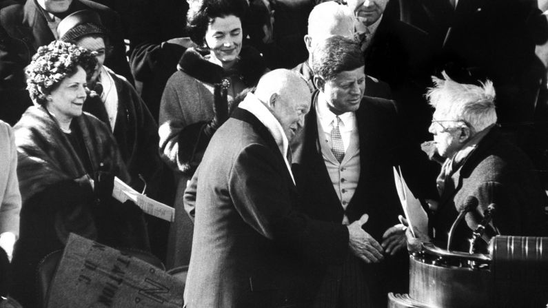Kennedy greets Robert Frost, right, after a reading by the poet. Frost recited from memory his poem, "The Gift Outright," marking the first time a poet participated in an inaugural program. <a href="index.php?page=&url=https%3A%2F%2Fwww.poets.org%2Fpoetsorg%2Ftext%2Fpoetry-and-power-robert-frosts-inaugural-reading" target="_blank" target="_blank">According to the Academy of American Poets</a>, Frost had written a new piece for the occasion called "Dedication," which he planned to recite as a preface to "The Gift Outright." But it was a cold and sunny day, and because of the bright sunlight reflecting off the snow-covered grounds, he was unable to see and read his newly composed piece.